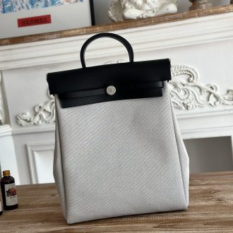 Hermes Elegant Canvas and Leather Backpack