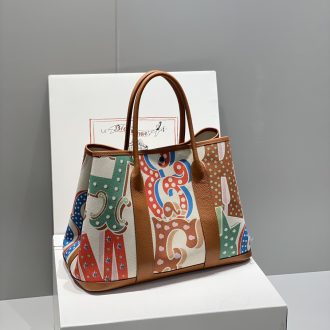 Hermes Hermès Printed Canvas and Leather Tote