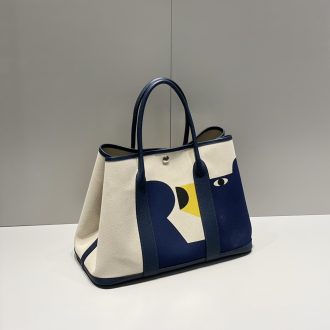 Hermes Graphic Canvas and Leather Tote Bag