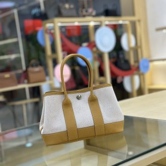 Hermes Hermès Canvas and Leather Tote Bag