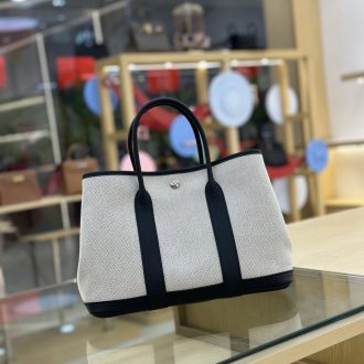 Hermes Elegant Canvas and Leather Tote Bag