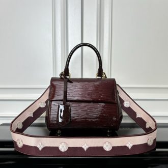 Elegant Burgundy Satchel with Embroidered Strap