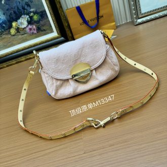Elegant Soft Pink Handbag with Gold Accents