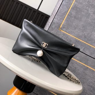 Chanel Elegant Leather Clutch with Pearl Accent